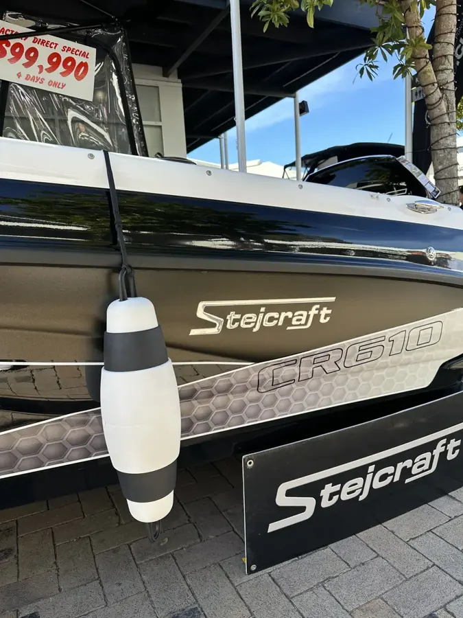 POP Fender hanging from a Stejcraft boat rail